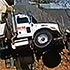 Company boomtruck's outrigger failure injures two technicians